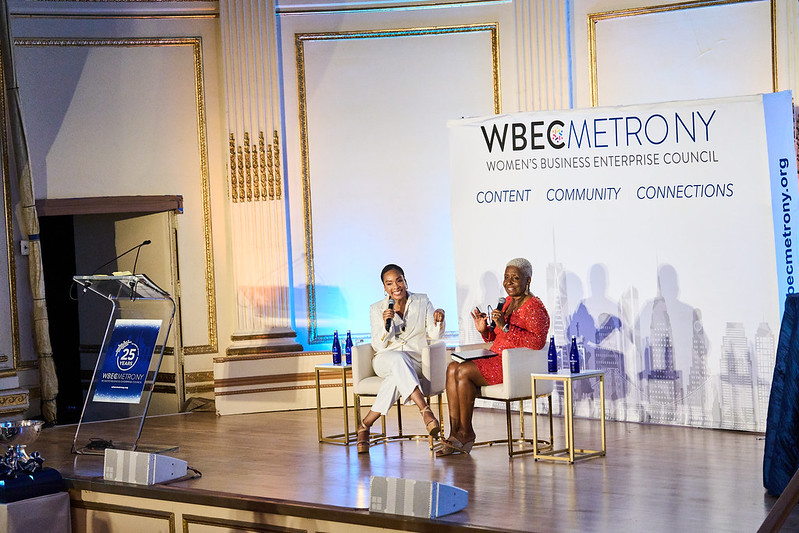 Keynote speakers conversing on stage at WBEC Metro NY Grand Gala-xy Luncheon