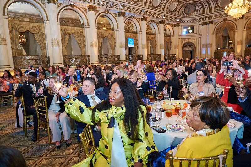 Crowd toasting at WBEC Metro NY Grand Gala-xy Luncheon