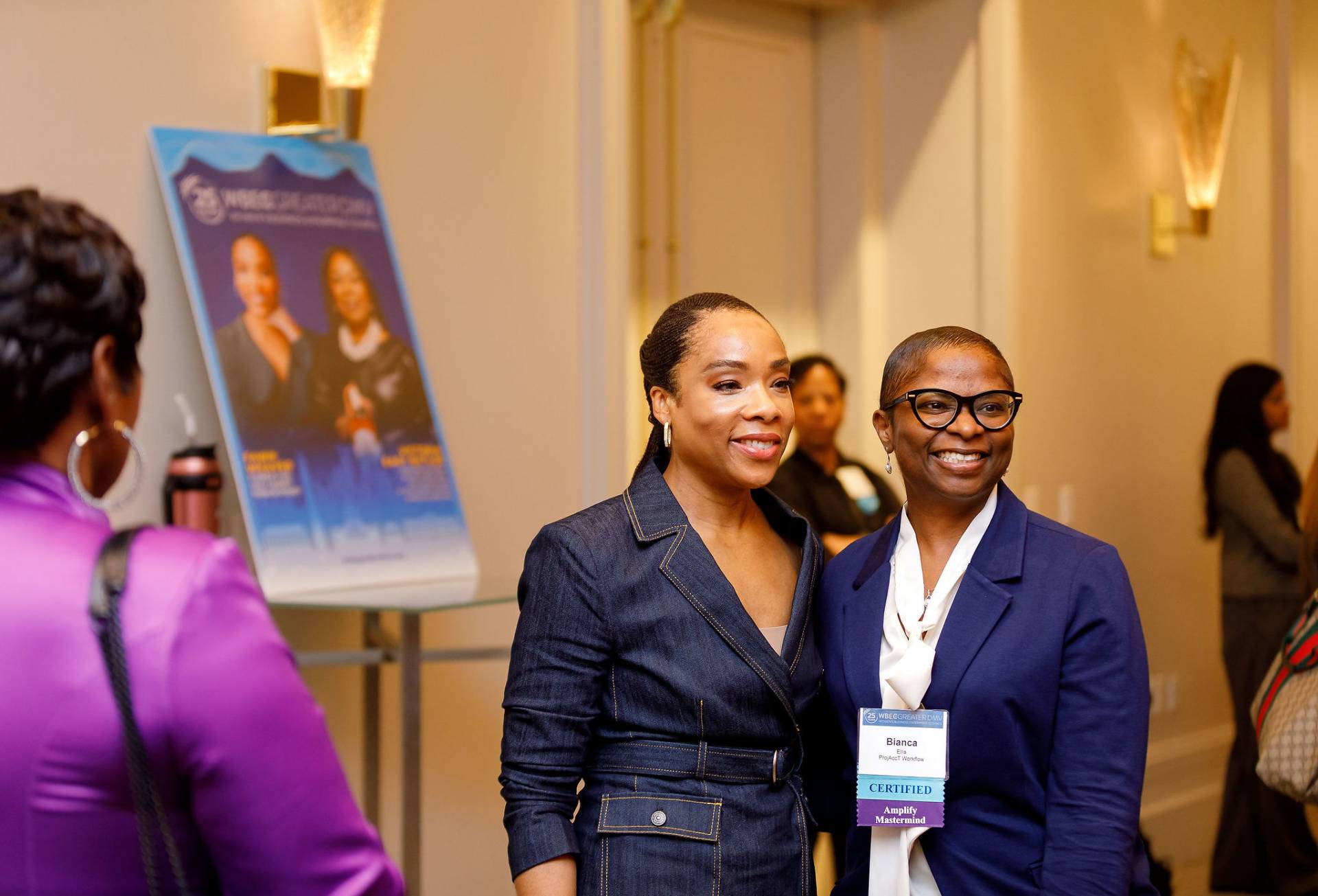 Women sitting at table speaking at the 2022 WBENC Conference